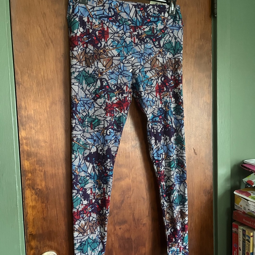 LULARoe Disney leggings, size Tall & Curvy.  Dr. Facilier pattern in the print.